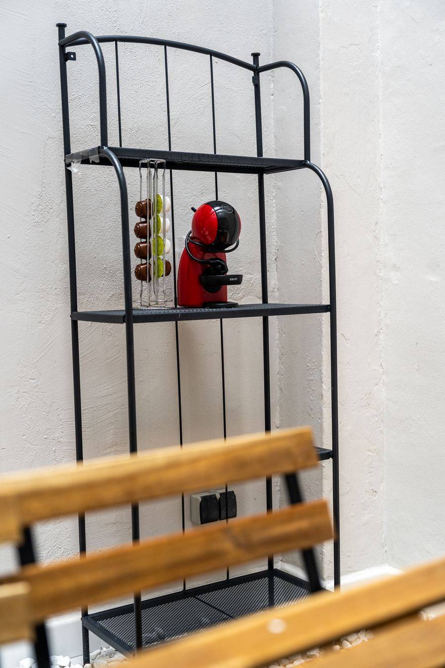 Patio shelf with capsule coffee machine
