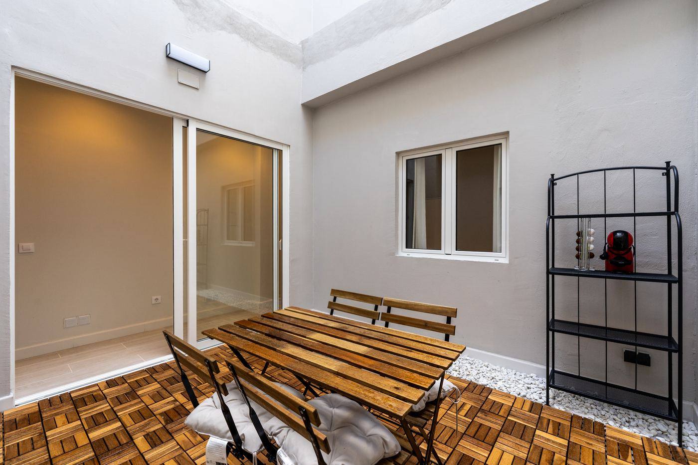 Inner patio with table and coffee machine